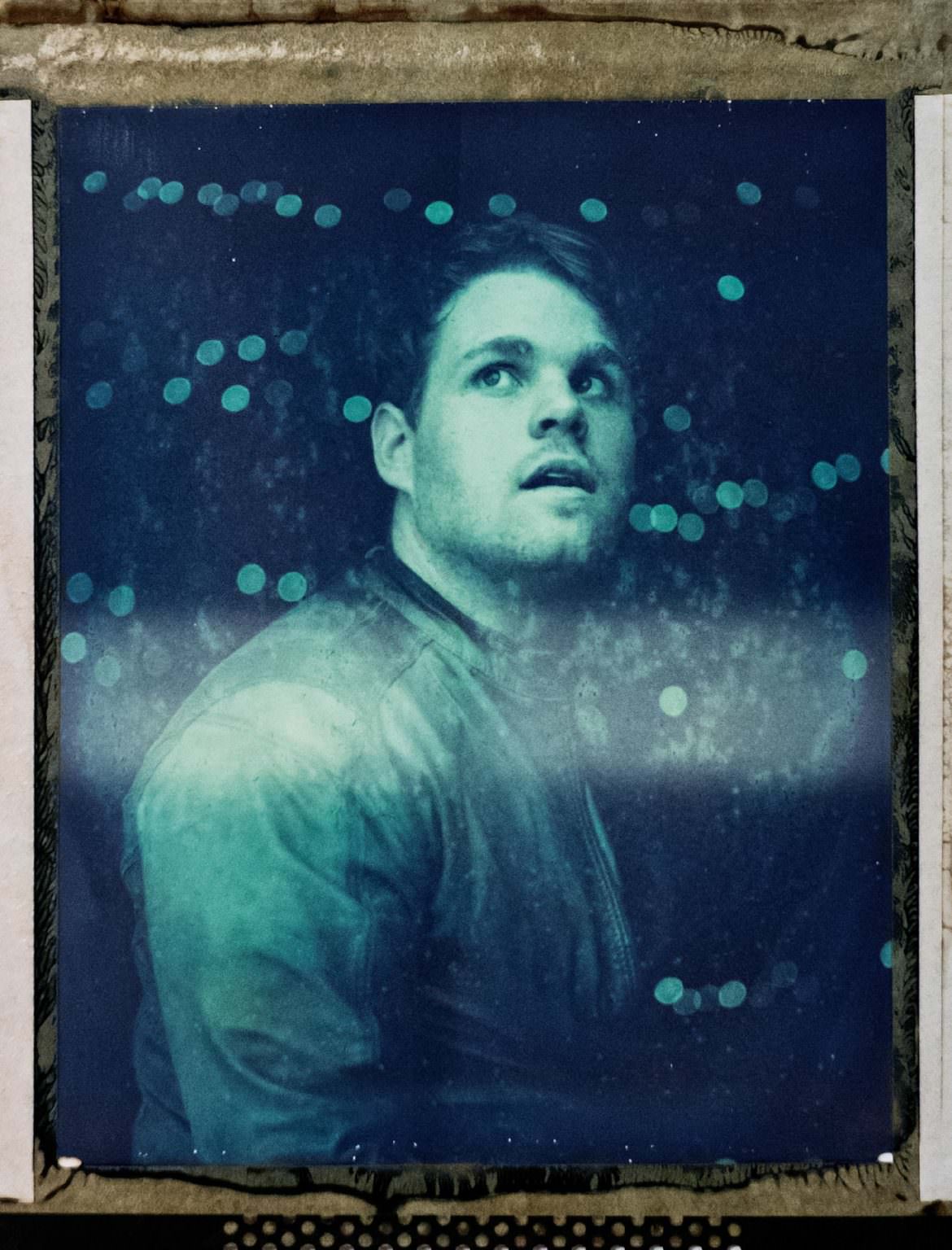 A portrait of Mike Waters on type 55 Polaroid film